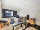 Basement with weightlifting equipment near window with nice view, plus storage and other items at 24 Pine Valley Rd, Evergreen, CO 80439
