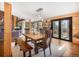 Beautiful dining room with view of living room and outdoor views at 24 Pine Valley Rd, Evergreen, CO 80439