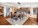 Dining room is filled with light from view to living room at 24 Pine Valley Rd, Evergreen, CO 80439
