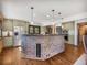 Elegant kitchen with a stone island and stainless steel appliances at 24 Pine Valley Rd, Evergreen, CO 80439