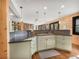 Well-equipped kitchen with custom cabinets and granite countertops at 24 Pine Valley Rd, Evergreen, CO 80439