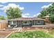 Dark gray house exterior with a landscaped yard at 3356 S Julian St, Englewood, CO 80110