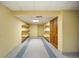 Finished basement with built-in shelving, neutral paint, and durable flooring, perfect for storage or hobbies at 2432 S Columbine St, Denver, CO 80210
