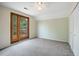 Cozy bedroom with a private balcony and natural light perfect for creating a peaceful retreat at 2432 S Columbine St, Denver, CO 80210