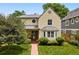 Inviting two-story home with well-maintained lawn and mature landscaping at 2432 S Columbine St, Denver, CO 80210