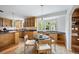 Charming eat-in kitchen with updated appliances and natural light at 2432 S Columbine St, Denver, CO 80210