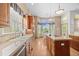 Spacious kitchen featuring an island, stainless steel appliances, and lots of natural light at 1051 Bramblewood Dr, Castle Pines, CO 80108
