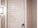 Apartment door featuring unit number and a modern design at 12983 W Ida Ave # 304, Littleton, CO 80127