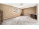 Bedroom with a large window, carpet, neutral walls and ceiling fan at 13036 Clayton Ct, Thornton, CO 80241