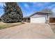Charming single-Gathering home featuring a two-car garage and a well-manicured front lawn at 13036 Clayton Ct, Thornton, CO 80241
