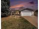 Charming single-Gathering home featuring a well-manicured lawn and an attached two-car garage at 13036 Clayton Ct, Thornton, CO 80241