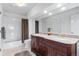 Bathroom featuring tub shower combo, double sink vanity at 2032 W Nantucket Ct, Littleton, CO 80120