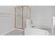 Bathroom with shower, tub and gold trim at 2032 W Nantucket Ct, Littleton, CO 80120