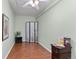Carpeted bedroom with mint walls at 2032 W Nantucket Ct, Littleton, CO 80120