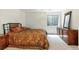 Traditional bedroom with carpet, window with blinds, dresser and mirror at 2032 W Nantucket Ct, Littleton, CO 80120