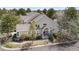 Charming two-story home with neutral siding, well-manicured landscaping, and a welcoming front entrance at 2032 W Nantucket Ct, Littleton, CO 80120