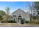 Charming two-story home with a well-manicured lawn and mature trees at 2032 W Nantucket Ct, Littleton, CO 80120