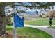 Community park sign showing rules and park hours with grassy landscape at 2032 W Nantucket Ct, Littleton, CO 80120