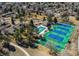 Overhead shot of community tennis and basketball courts next to a walking path at 8109 E Phillips Cir, Centennial, CO 80112