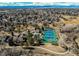 Aerial view of neighborhood with community amenities including a pool and tennis courts at 8109 E Phillips Cir, Centennial, CO 80112