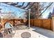 Backyard patio area with a pergola, outdoor furniture, and privacy fence at 8109 E Phillips Cir, Centennial, CO 80112