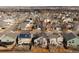 A sprawling aerial view of a residential neighborhood, revealing a mix of home designs at 16510 Buckthorn Ln, Parker, CO 80134