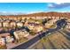 An aerial view of a sprawling neighborhood near rolling hills at 2090 Bellavista St, Castle Rock, CO 80109