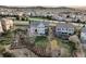 This aerial view showcases the backyard, including a hot tub and outdoor kitchen at 2090 Bellavista St, Castle Rock, CO 80109