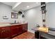 A large basement area with ample cabinet space and wood floors at 2090 Bellavista St, Castle Rock, CO 80109