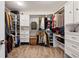Walk-in closet provides ample storage with custom shelving and organization at 2090 Bellavista St, Castle Rock, CO 80109