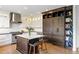Spacious kitchen features a large island with seating, stainless steel appliances, and stylish cabinetry at 2090 Bellavista St, Castle Rock, CO 80109