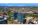 Stunning aerial view of two modern apartment buildings with a rooftop pool and mountain views at 1700 Bassett St # 1014, Denver, CO 80202
