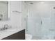 Stylish bathroom featuring a vanity with marble countertop and glass-enclosed shower at 1700 Bassett St # 1014, Denver, CO 80202