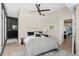 Comfortable bedroom with natural light, hardwood floors, and neutral decor at 1700 Bassett St # 1014, Denver, CO 80202