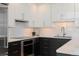 Modern kitchen with stainless steel appliances and white marble backsplash at 1700 Bassett St # 1014, Denver, CO 80202
