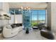 Modern living room with floor-to-ceiling windows and city views at 1700 Bassett St # 1014, Denver, CO 80202