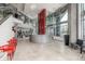 Contemporary lobby with a reception desk, waiting area, and access to the fitness center and other amenities at 1700 Bassett St # 1014, Denver, CO 80202