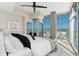 Serene primary bedroom featuring floor-to-ceiling windows and balcony access with city and mountain views at 1700 Bassett St # 1014, Denver, CO 80202