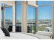 Bright primary bedroom showcasing balcony access and stunning views of the cityscape at 1700 Bassett St # 1014, Denver, CO 80202