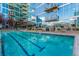 Inviting swimming pool with clear blue water, set against a modern building with balconies at 1700 Bassett St # 1014, Denver, CO 80202