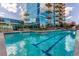 Inviting swimming pool with clear blue water, set against a modern building with balconies at 1700 Bassett St # 1014, Denver, CO 80202