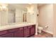 Bathroom with double sinks, updated fixtures, and tile flooring at 1630 N Clarkson St # 204, Denver, CO 80218