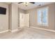 Neutral bedroom with closet and window with plantation shutters at 1630 N Clarkson St # 204, Denver, CO 80218