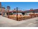 Unique restaurant and bar space with a converted van, mural art, and planter box dividers for the outdoor seating area at 1630 N Clarkson St # 204, Denver, CO 80218