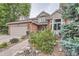 Beautiful two-story home with brick facade and inviting landscaping at 19098 E Ida Dr, Aurora, CO 80015