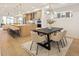 Elegant dining area with modern table, chairs, and stylish lighting fixtures at 2060 Eliot St, Denver, CO 80211