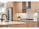 Close-up showcasing the kitchen's stainless steel appliances, custom cabinets, and modern finishes at 2060 Eliot St, Denver, CO 80211