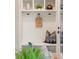 Well-organized mudroom area with built-in storage and a convenient bench at 2060 Eliot St, Denver, CO 80211