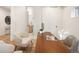 Bright office space with wooden desk, white walls, and stylish decor, adjacent to a bathroom, perfect for a productive work environment at 2060 Eliot St, Denver, CO 80211