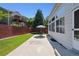 Backyard view with patio and lawn at 13362 Marion St, Thornton, CO 80241